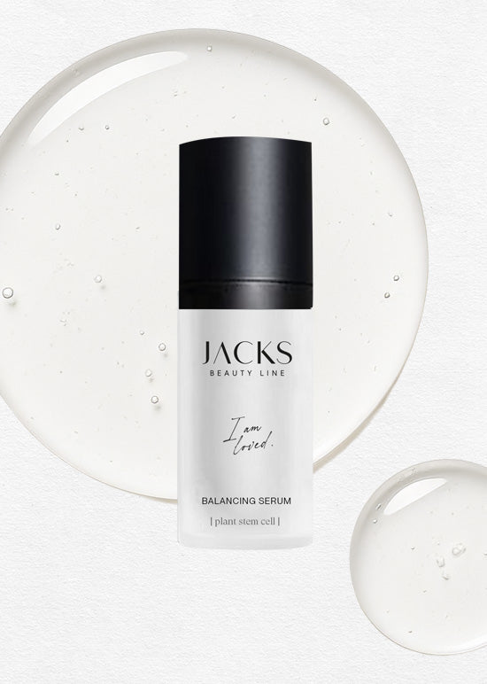 JACKS beauty line Balancing Serum mit Serumtropfen im Hintergrund