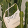 JACKS beauty line Self Love Shopper in Kakteen aufgehängt