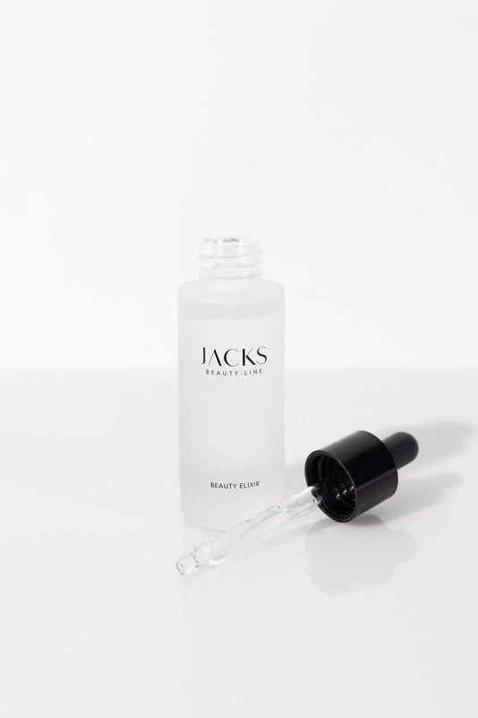 JACKS beauty line Beauty Elixir Flasche mit danebenliegender Pipette