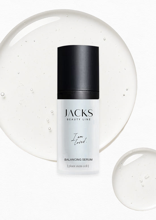 JACKS beauty line Balancing Serum mit Serumtropfen im Hintergrund